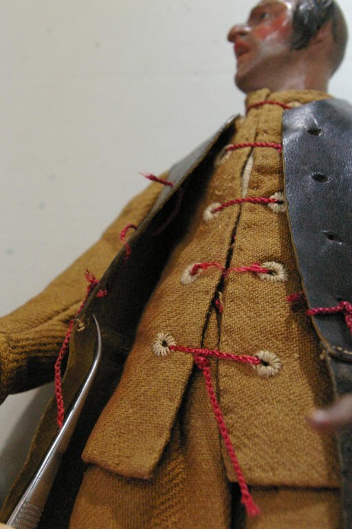 Puppe, Detail des textilen Objekts